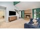A spacious living room with a cozy brick fireplace and modern furnishings at 8224 Park Vista Cir, Charlotte, NC 28226