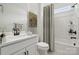 Bright bathroom featuring modern fixtures, a bathtub with shower, and a vanity with storage at 896 Exeter Dr, Sherrills Ford, NC 28673