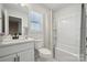 Clean bathroom featuring a combined shower and tub with modern fixtures and a neutral color scheme at 896 Exeter Dr, Sherrills Ford, NC 28673