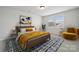 Bright bedroom with a large bed, stylish rug, and modern decor that create a comfortable and inviting space at 896 Exeter Dr, Sherrills Ford, NC 28673