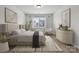 Bedroom with a large window providing natural light and neutral decor at 896 Exeter Dr, Sherrills Ford, NC 28673