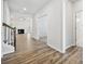 Inviting foyer with hardwood floors, staircase, and an open view into the living room at 896 Exeter Dr, Sherrills Ford, NC 28673