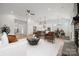 Bright and airy open-concept living space with modern furnishings and decor, flowing into the kitchen at 896 Exeter Dr, Sherrills Ford, NC 28673