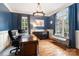 Spacious office features hardwood floors, large windows and ample natural light at 9011 Pine Laurel Dr, Weddington, NC 28104