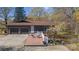 Home featuring a spacious rear deck, two-car garage, and well maintained outdoor space at 118 Lakewood Dr, Kings Mountain, NC 28086