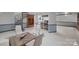 Spacious basement area featuring a spiral staircase and an inviting seating area for entertainment at 118 Lakewood Dr, Kings Mountain, NC 28086