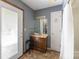 Bathroom with walkout door to the backyard; nice vanity at 118 Lakewood Dr, Kings Mountain, NC 28086