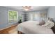 Bedroom featuring hardwood floors, natural light, and a door to the deck at 118 Lakewood Dr, Kings Mountain, NC 28086