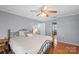 Spacious bedroom features hardwood floors, ceiling fan and ensuite bathroom at 118 Lakewood Dr, Kings Mountain, NC 28086