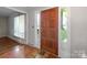 Inviting front entrance featuring a wood door with sidelights and a patterned entry rug at 118 Lakewood Dr, Kings Mountain, NC 28086