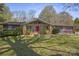 Charming stone-accented home with a red front door and well-manicured front yard at 118 Lakewood Dr, Kings Mountain, NC 28086