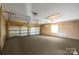 Spacious garage with three doors and ample ceiling height, perfect for parking and storage at 118 Lakewood Dr, Kings Mountain, NC 28086