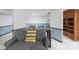 Finished basement featuring a gray couch, chairs, and an open floor plan at 118 Lakewood Dr, Kings Mountain, NC 28086