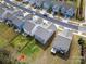 An aerial backyard view showing homesites, neighborhood, and the surrounding green space at 1268 Scotch Meadows Loop, Monroe, NC 28110