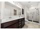 Bathroom features double sinks, a large mirror and shower at 1268 Scotch Meadows Loop, Monroe, NC 28110