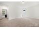 Bright bedroom features neutral carpeting, white walls and good natural light at 1268 Scotch Meadows Loop, Monroe, NC 28110
