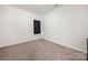 Bedroom with neutral walls, carpet floors, and a window with blinds providing natural light at 1268 Scotch Meadows Loop, Monroe, NC 28110