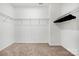 Spacious walk-in closet with carpeted flooring and wire shelving for ample storage at 1268 Scotch Meadows Loop, Monroe, NC 28110