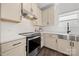 Stylish kitchen with stainless steel appliances, subway tile backsplash, and contemporary finishes at 1268 Scotch Meadows Loop, Monroe, NC 28110