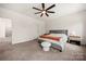 Large bedroom with natural light and ceiling fan at 1268 Scotch Meadows Loop, Monroe, NC 28110