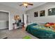 Bedroom featuring a desk area, bright natural light from a window, and comfortable space at 128 Stibbs Cross Rd, Mooresville, NC 28115