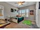 Bedroom with a large window, fun decorations, and comfortable space for rest and play at 128 Stibbs Cross Rd, Mooresville, NC 28115