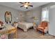 Bedroom with a cozy chair, decor, and inviting space for rest and relaxation at 128 Stibbs Cross Rd, Mooresville, NC 28115