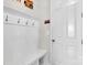 Bright hallway with a bench, hooks, and storage; perfect for organizing belongings at 128 Stibbs Cross Rd, Mooresville, NC 28115