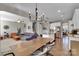 Open-concept living space with a cozy living room, dining area, and modern kitchen at 128 Stibbs Cross Rd, Mooresville, NC 28115