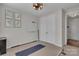 Workout room featuring neutral paint colors, carpet flooring, and a bright light fixture at 128 Stibbs Cross Rd, Mooresville, NC 28115
