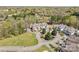 Aerial view of a townhome community with manicured lawns and mature trees at 1386 21St Ne Ave, Hickory, NC 28601
