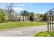 Exterior view of a residential community with manicured lawns, mature trees, and well-maintained homes at 1386 21St Ne Ave, Hickory, NC 28601