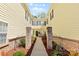 Attractive walkway with brick columns and wrought iron fencing leading to the front door at 1386 21St Ne Ave, Hickory, NC 28601