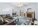 Inviting living room with a brick fireplace, access to the patio, and comfortable seating at 1386 21St Ne Ave, Hickory, NC 28601