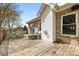 Back deck of home, with outdoor seating, brick exterior and wooden planks at 139 Meadow Oaks Dr, Statesville, NC 28625