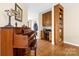 Inviting entryway featuring hardwood floors, piano and built-in desk area at 139 Meadow Oaks Dr, Statesville, NC 28625