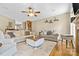 Inviting living room with hardwood floors, ceiling fan and neutral color palette at 139 Meadow Oaks Dr, Statesville, NC 28625