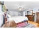 Spacious main bedroom with hardwood floors, ceiling fan and ensuite bathroom at 139 Meadow Oaks Dr, Statesville, NC 28625