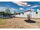 Fenced backyard featuring a trampoline, minimal landscaping, and dry grass at 1495 Imperial Ct, York, SC 29745