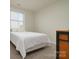 Bright bedroom with a white bed and comforter complemented by natural light from a window at 1495 Imperial Ct, York, SC 29745