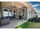 Covered patio with stylish outdoor seating, a ceiling fan, and a grill for outdoor cooking at 1495 Imperial Ct, York, SC 29745