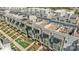 Aerial view of townhouses showcasing rooftop patios and manicured lawns at 1617 Cannon View Ln, Charlotte, NC 28208