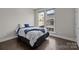 Bright bedroom includes hardwood floors and natural light, offering a comfortable and inviting space at 1617 Cannon View Ln, Charlotte, NC 28208