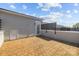A roof deck with light brown paving stones is partially enclosed by a gray privacy fence at 1617 Cannon View Ln, Charlotte, NC 28208