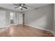 Bedroom featuring hardwood floors and a view into the bathroom at 1801 Weststone Dr, Charlotte, NC 28208