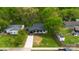 Aerial view of the home showing the driveway, manicured lawn, and updated exterior at 1812 Lot 2 Anderson St, Charlotte, NC 28205