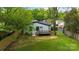Aerial view of backyard featuring a deck with wooden railings and lawn at 1812 Lot 2 Anderson St, Charlotte, NC 28205