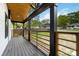 View from the porch showcasing the spacious backyard and new wood railing at 1812 Lot 2 Anderson St, Charlotte, NC 28205