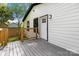 Exterior of home, features the back door and stained wooden deck at 1812 Lot 2 Anderson St, Charlotte, NC 28205