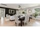 Well-lit dining area with modern furnishings, adjacent to a stylish living space, provides an inviting atmosphere at 1812 Lot 2 Anderson St, Charlotte, NC 28205